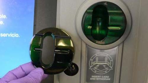 Image of a debit card skimmer at an ATM